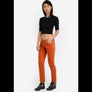 Anthropologie | Paige “Troy Boy Slacker” Rio Orange Skinny Jean Size 26